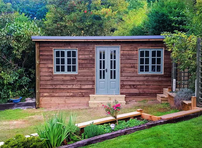 Timber garden cabin with flat roof Surrey